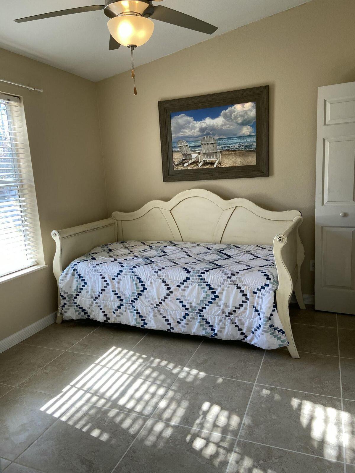 19 Plantation Way Santa Rosa Beach, FL 32459 - Photo 18 of 36 a bedroom with a bed and a painting on the wall