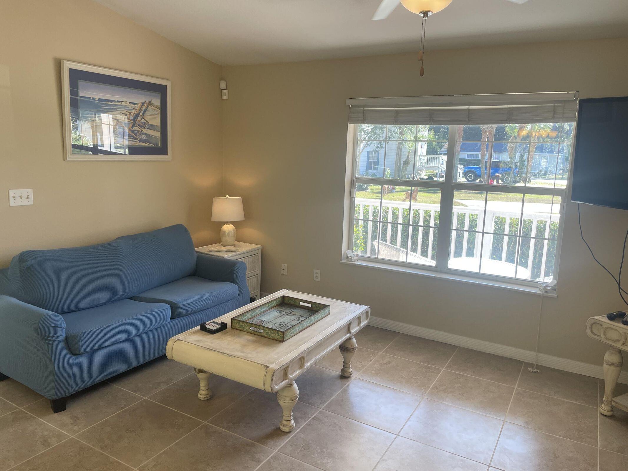 19 Plantation Way Santa Rosa Beach, FL 32459 - Photo 26 of 36 a living room with furniture and a window