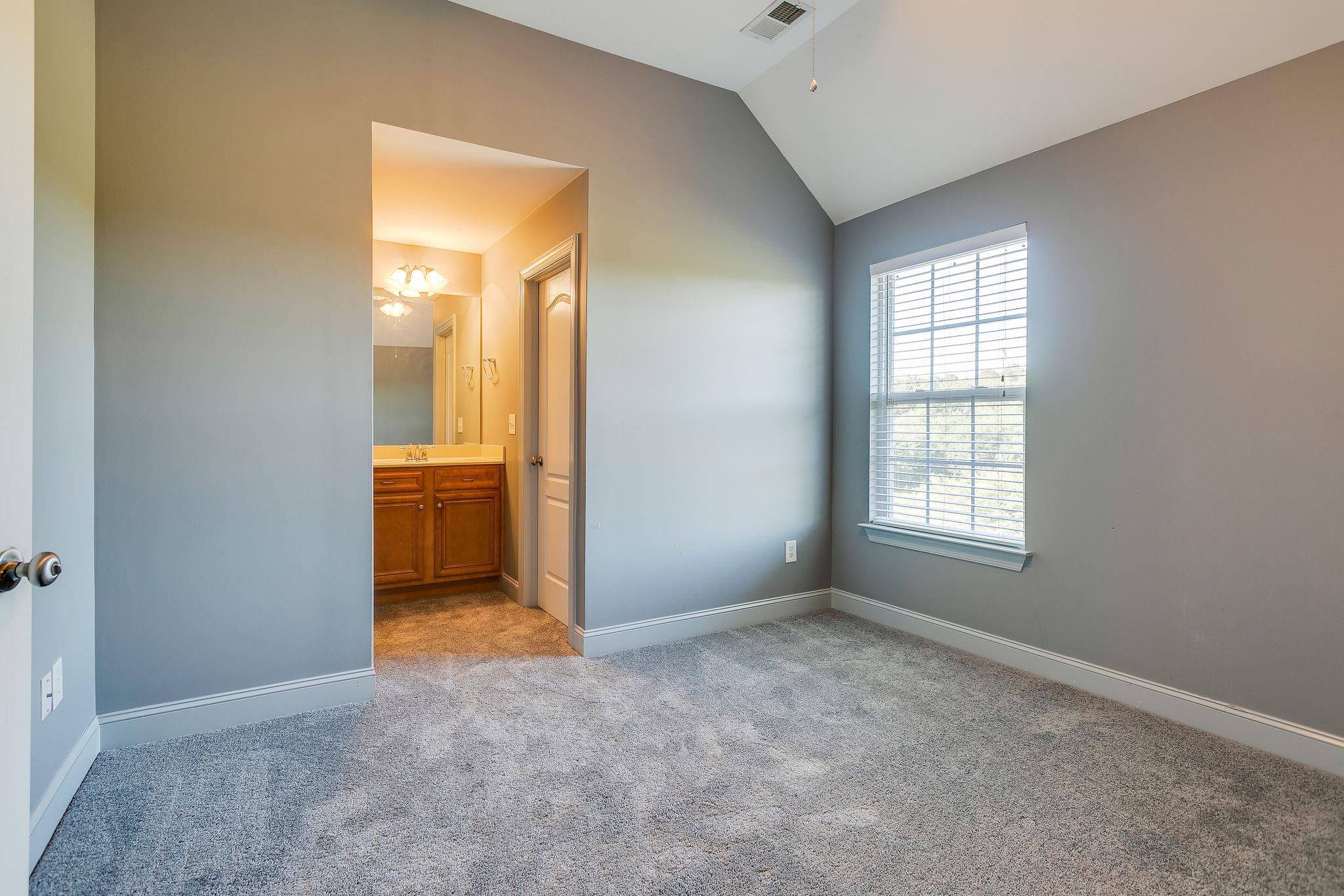 2029 Lincoln Road Spring Hill, TN 37174 - Photo 20 of 30 an empty room with windows and closet