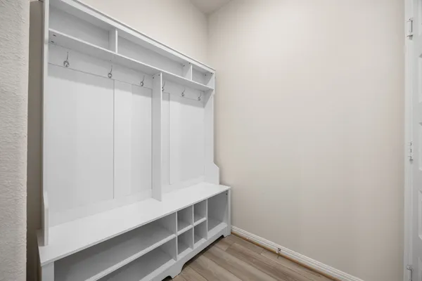 a view of an empty walk in closet
