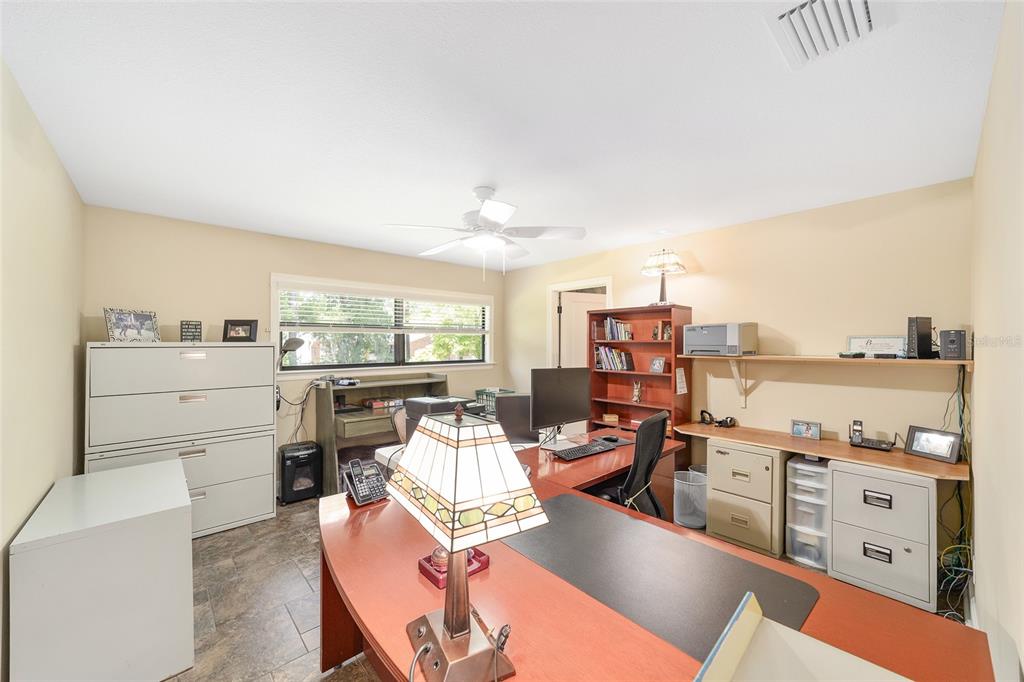 3200 Northeast 97th Street Road Anthony, FL 32617 - Photo 37 of 75 a living room with furniture and a large window