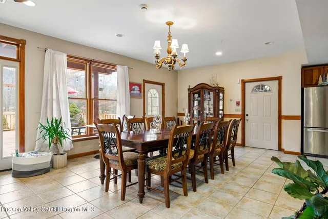 a very nice looking living room with furniture and a large window