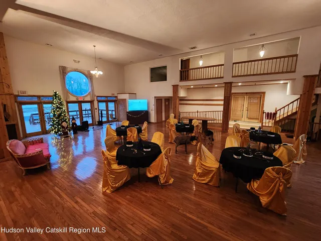 a bathroom with a sink mirror and toilet