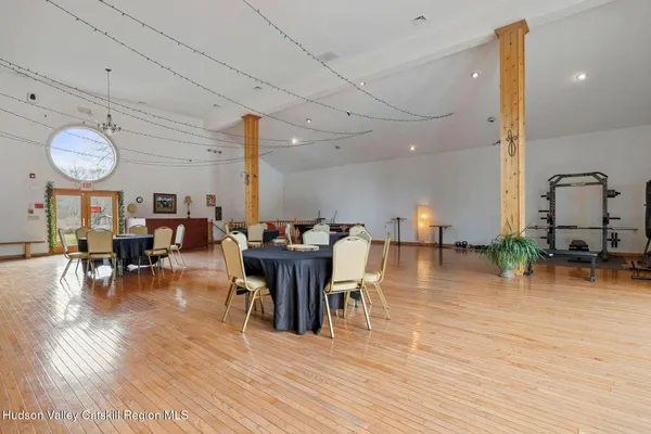 a view of a two chairs on the roof deck