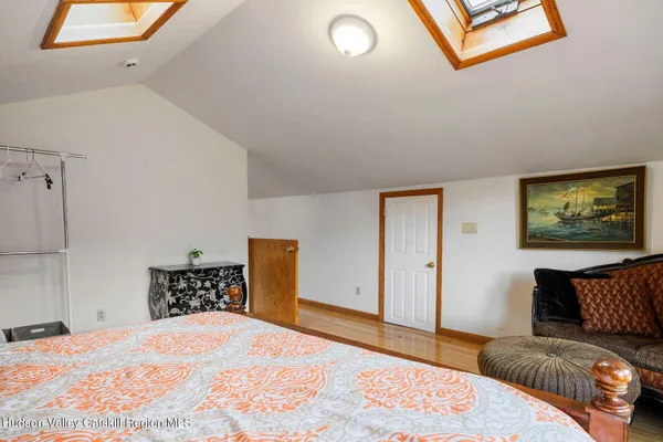 a view of a town with mountains in the background