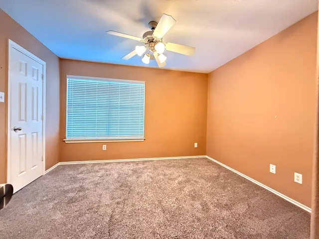 a front view of a house with a garage