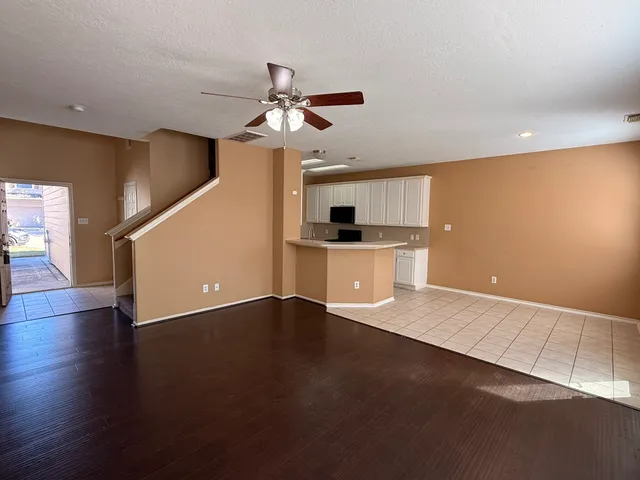 a view of a kitchen with a sink and dishwasher