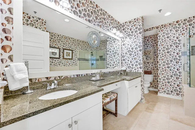 a bathroom with a bathtub and shower