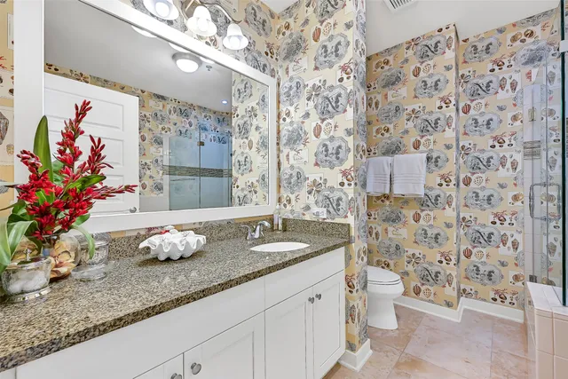 a bathroom with a bathtub and shower