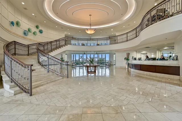 a living room with fireplace furniture and a flat screen tv