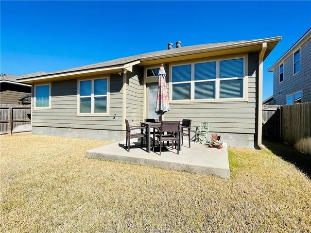 a view of house with outdoor space