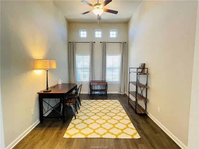 a bed room with a bed and a window