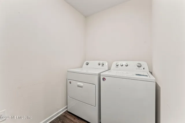 a utility room with dryer and washer