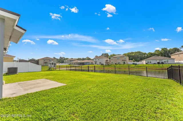 a view of an outdoor space and swimming pool