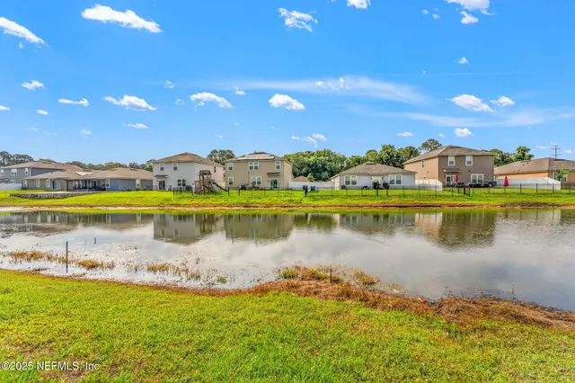 a view of a lake with a city