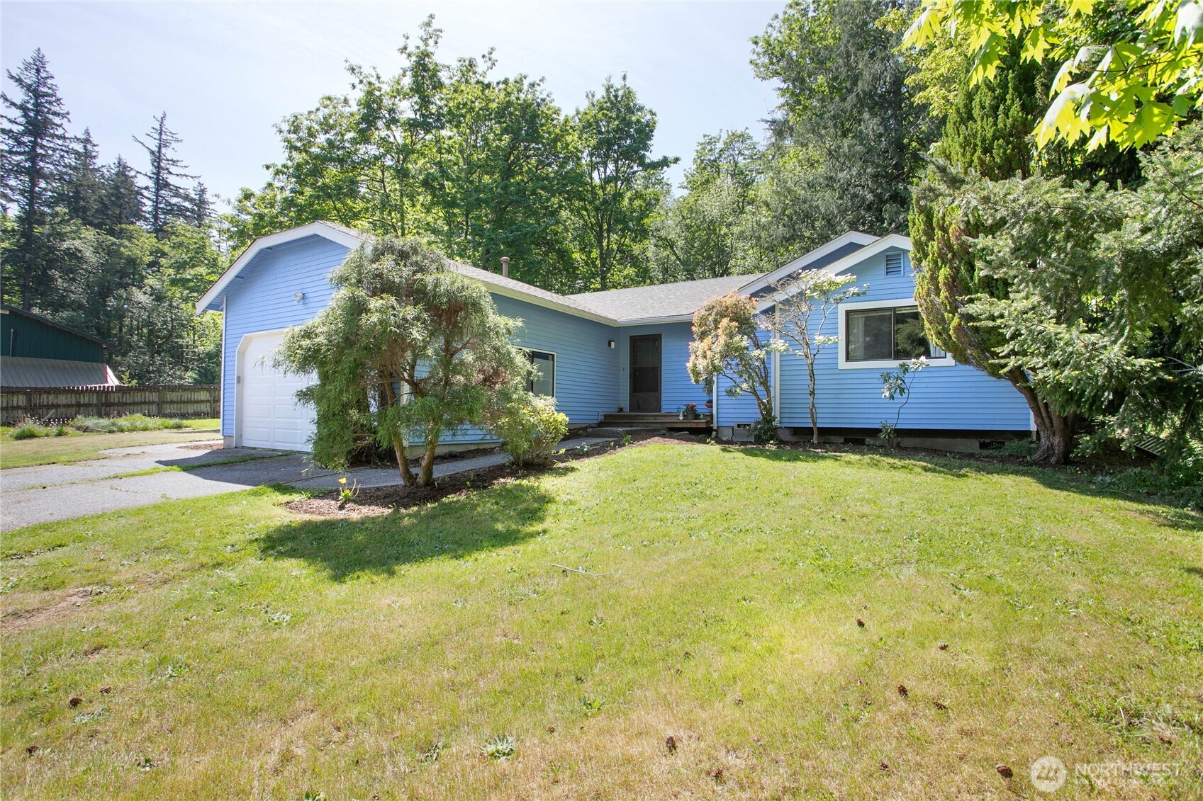 119 North 34th Street Bellingham, WA 98225 - Photo 1 of 21 a view of a house with a yard and sitting area