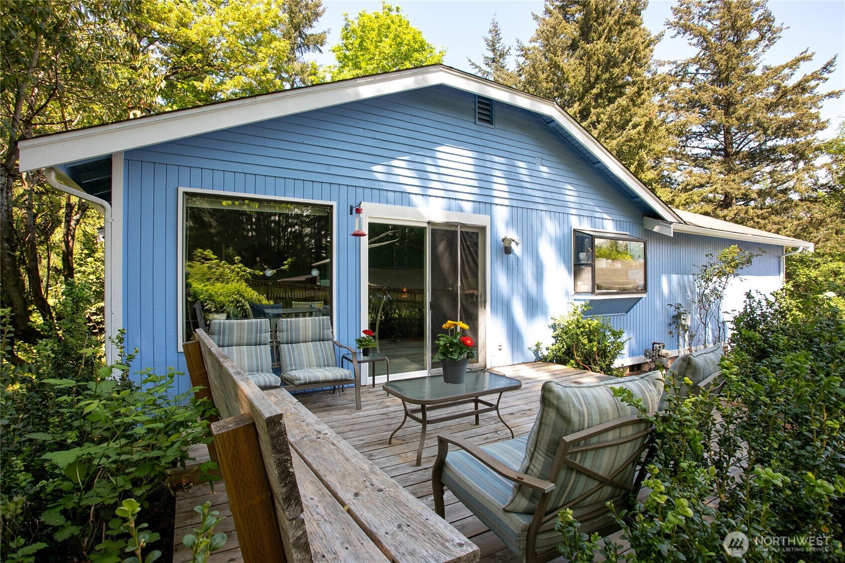 119 North 34th Street Bellingham, WA 98225 - Photo 20 of 21 a view of house with backyard sitting area and garden