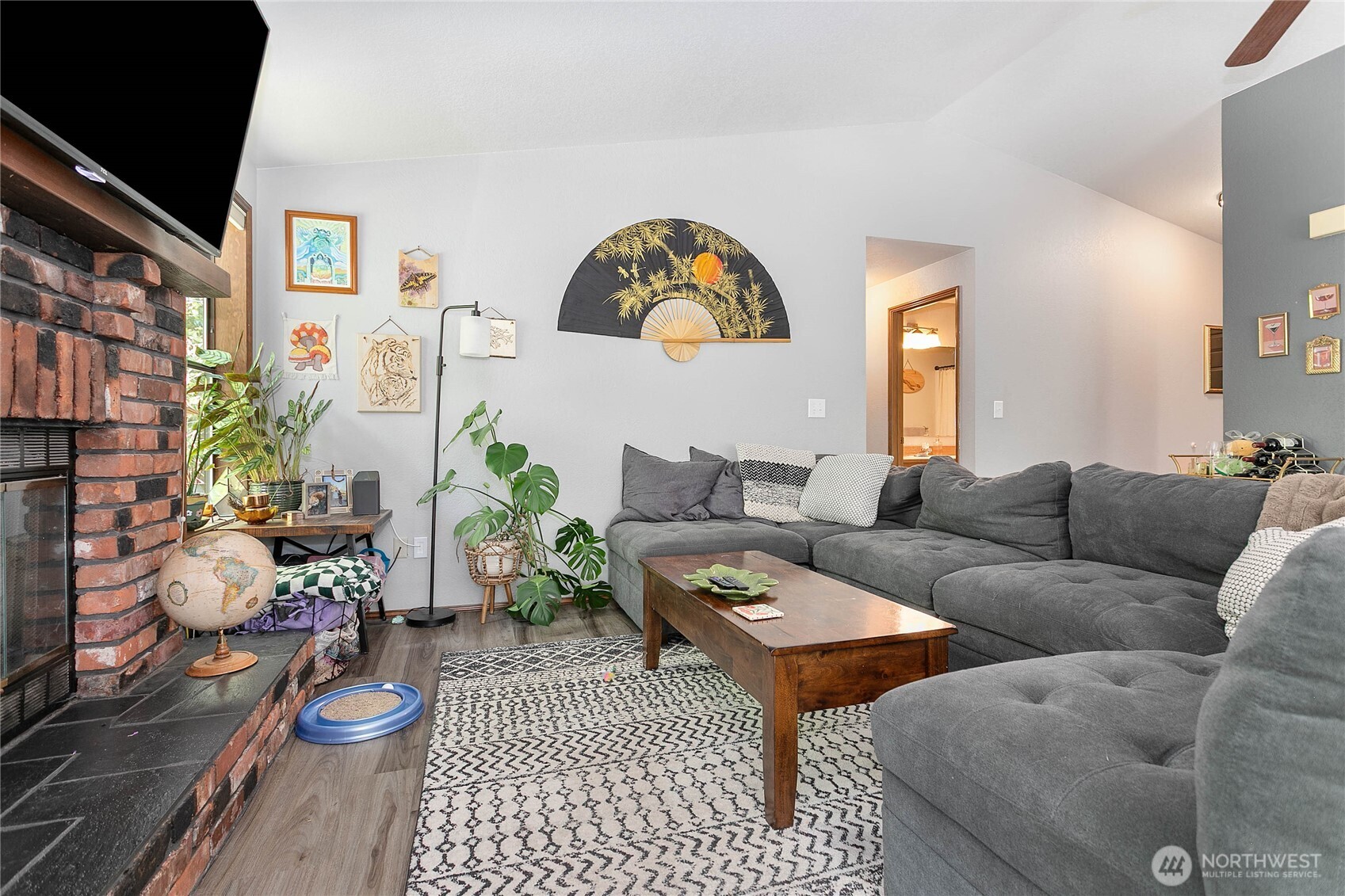 119 North 34th Street Bellingham, WA 98225 - Photo 3 of 21 a living room with furniture a rug and a window