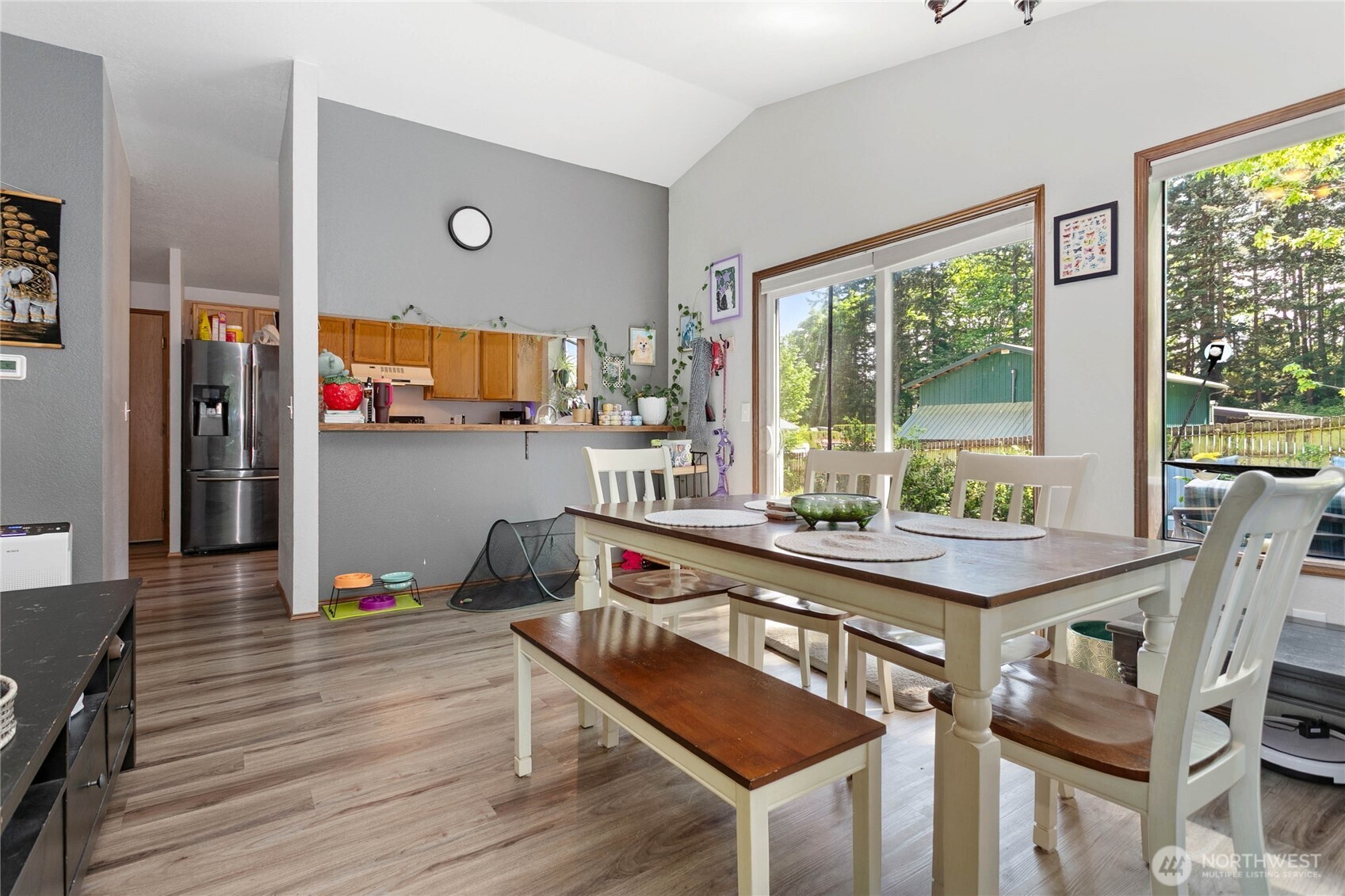 119 North 34th Street Bellingham, WA 98225 - Photo 7 of 21 a room with furniture a flat screen tv and a large window