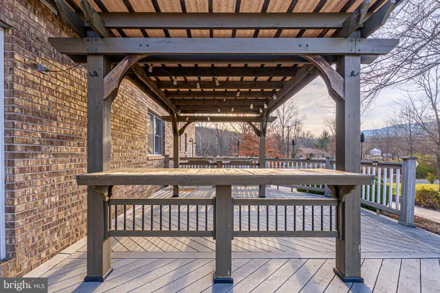 a view of balcony with wooden floor