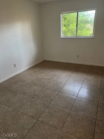 a view of a room that has a window in it