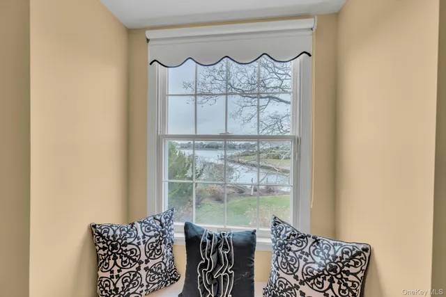a view of a balcony with furniture