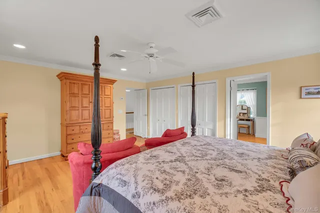 a bed room with a bed and a window