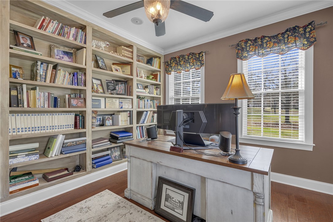 233 Bowen Drive Anderson, SC 29621 - Photo 17 of 50 This dedicated workspace offers custom built-in shelving, perfect for productivity and organization. With these beautiful windows and space, work may be enjoyable.