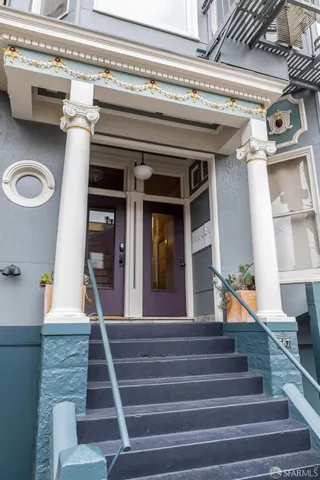 a view of entryway with a front door