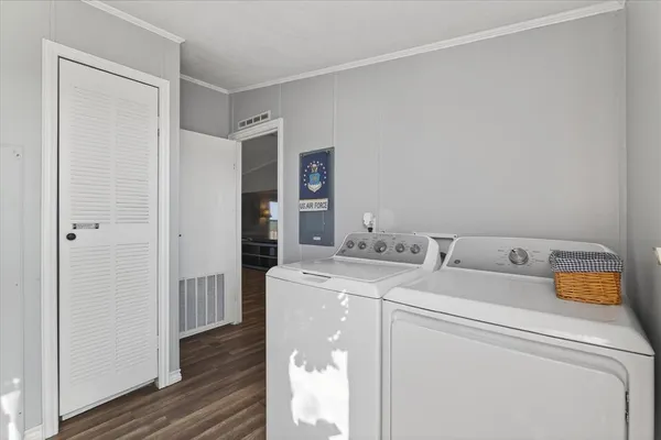 a utility room with dryer and washer
