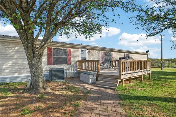 a balcony with chairs