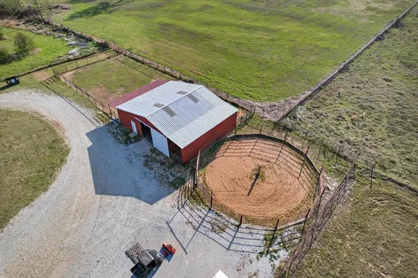 a view of a wooden floor with a lake view