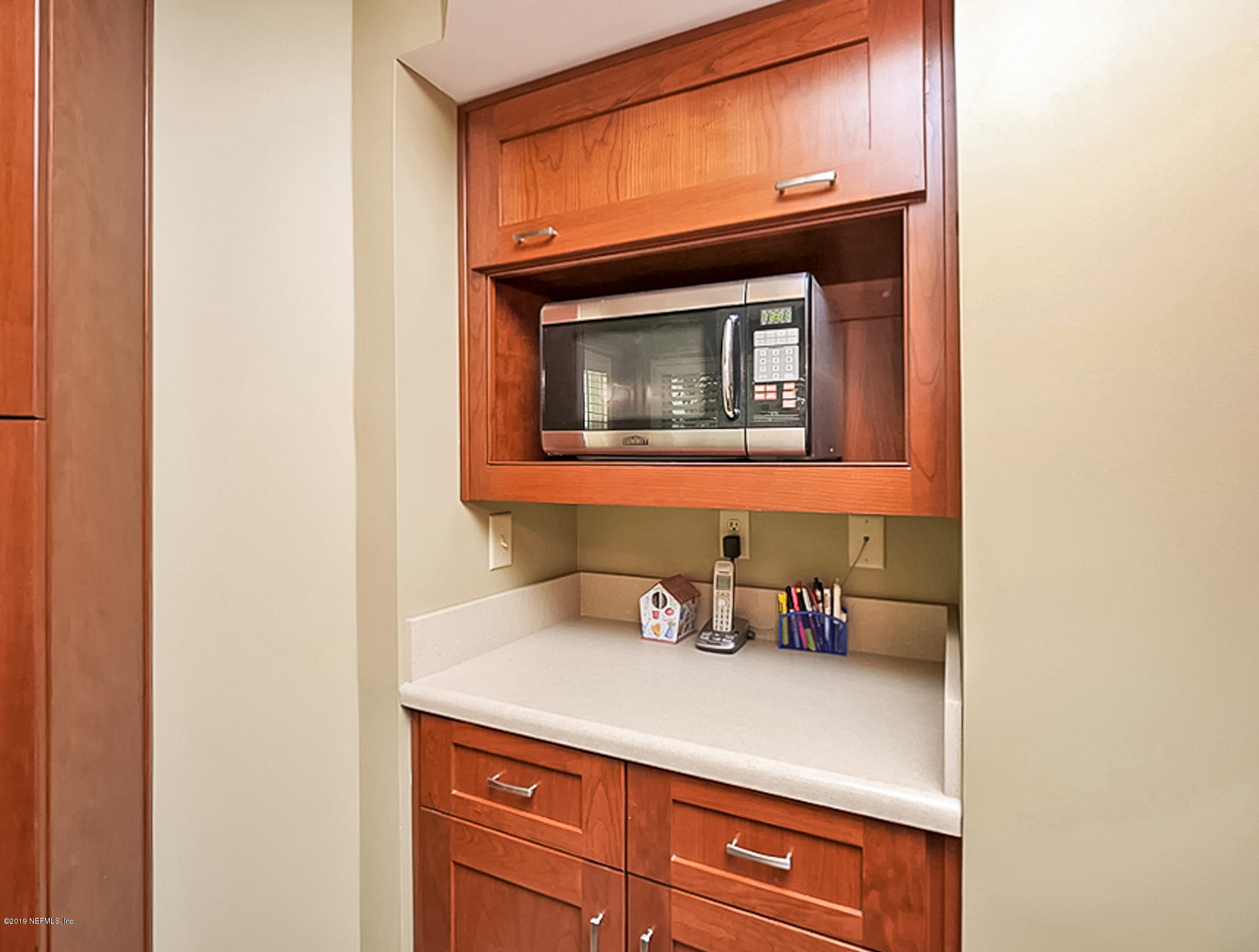 1917 Seminole Road Atlantic Beach, FL 32233 - Photo 11 of 30 a utility room with a sink and cabinets