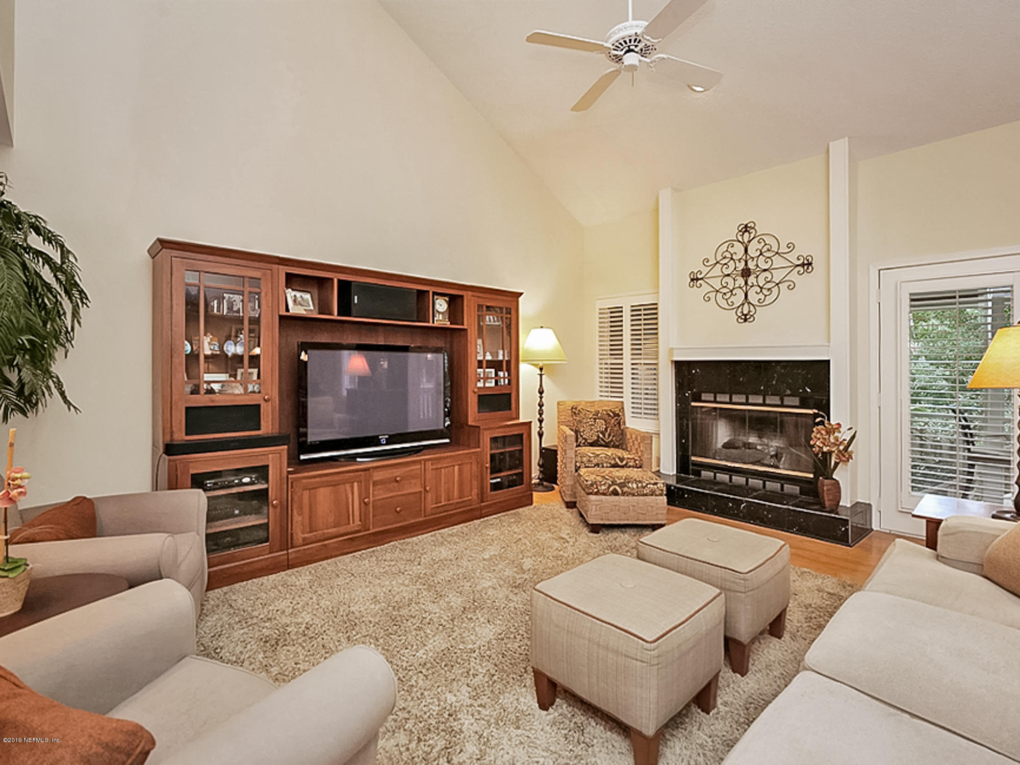 1917 Seminole Road Atlantic Beach, FL 32233 - Photo 4 of 30 a living room with furniture and a flat screen tv