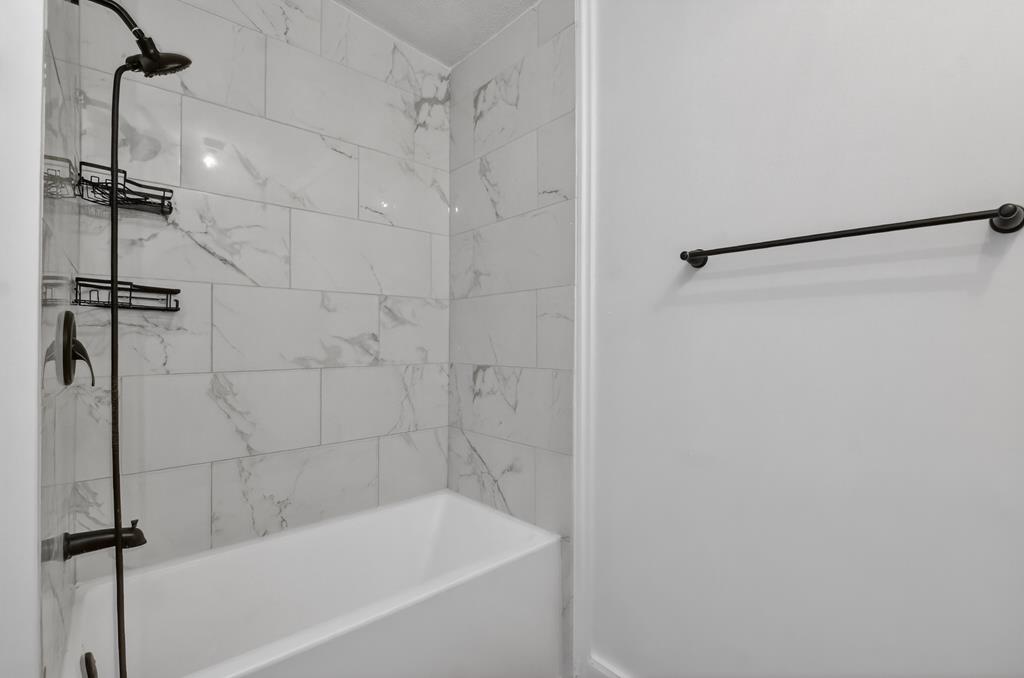 10967 Old Highway 76 Morganton, GA 30560 - Photo 21 of 31 a bathroom with a bathtub