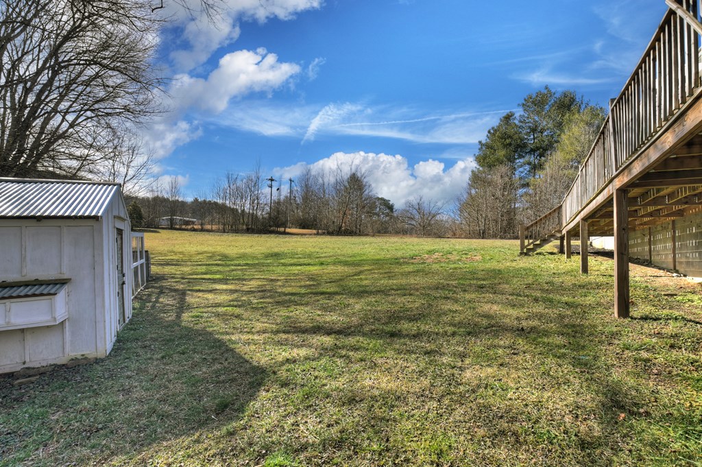 10967 Old Highway 76 Morganton, GA 30560 - Photo 24 of 31 a view of a yard with an outdoor space