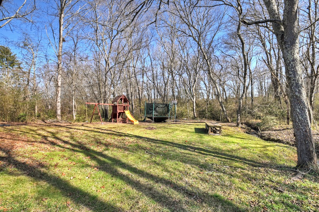 10967 Old Highway 76 Morganton, GA 30560 - Photo 27 of 31 a view of a playground with basketball court