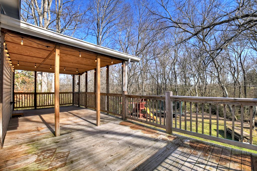 10967 Old Highway 76 Morganton, GA 30560 - Photo 30 of 31 a view of a roof deck with wooden fence and floor