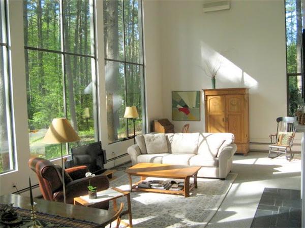 120 Still River Road Harvard, MA 01451 - Photo 1 of 22 a living room with furniture and a floor to ceiling window