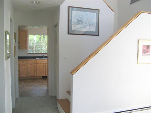 120 Still River Road Harvard, MA 01451 - Photo 19 of 22 a view of a hallway with closet and a window