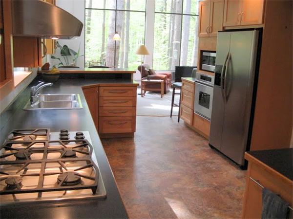 120 Still River Road Harvard, MA 01451 - Photo 4 of 22 a kitchen with stainless steel appliances granite countertop a stove a sink and a refrigerator