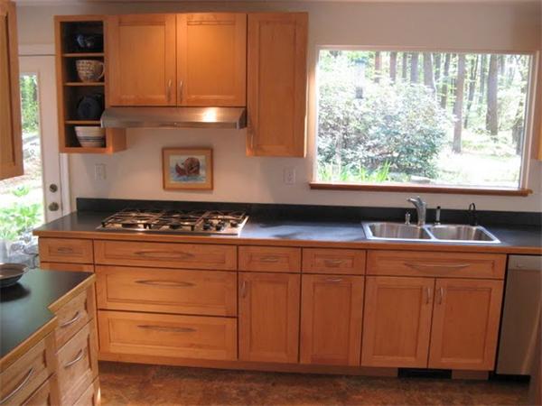120 Still River Road Harvard, MA 01451 - Photo 5 of 22 a kitchen with stainless steel appliances granite countertop a sink and a stove
