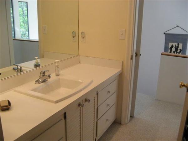120 Still River Road Harvard, MA 01451 - Photo 10 of 22 a bathroom with a sink and a mirror