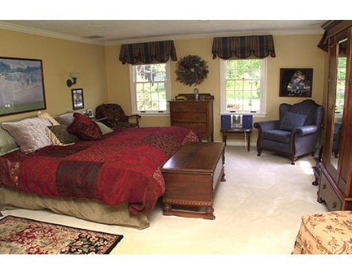 30 Virginia Ridge Road Sudbury, MA 01776 - Photo 12 of 23 a bedroom with furniture and a large window
