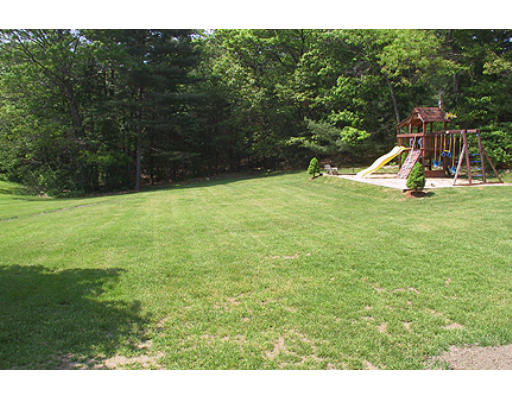 30 Virginia Ridge Road Sudbury, MA 01776 - Photo 22 of 23 a view of a park with a slide