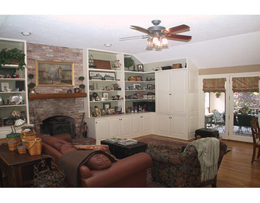 30 Virginia Ridge Road Sudbury, MA 01776 - Photo 5 of 23 a living room with furniture and a fireplace