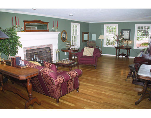 30 Virginia Ridge Road Sudbury, MA 01776 - Photo 6 of 23 a living room with furniture and a fireplace