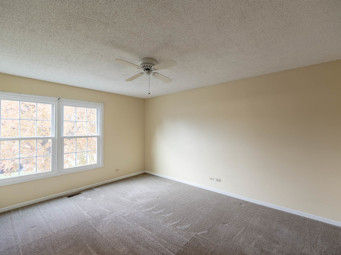 4 Candlewood Court Cary, IL 60013 - Photo 15 of 21 an empty room with a window