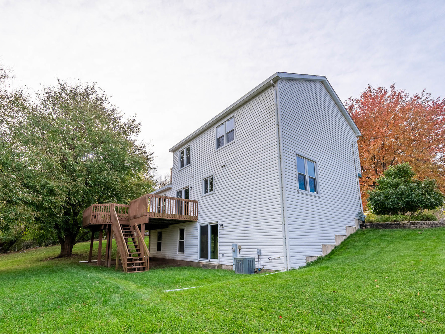4 Candlewood Court Cary, IL 60013 - Photo 19 of 21 a view of house with backyard
