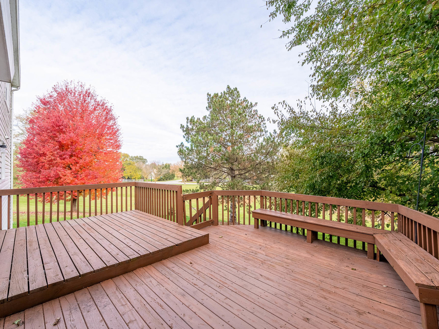 4 Candlewood Court Cary, IL 60013 - Photo 20 of 21 a view of deck with a large trees